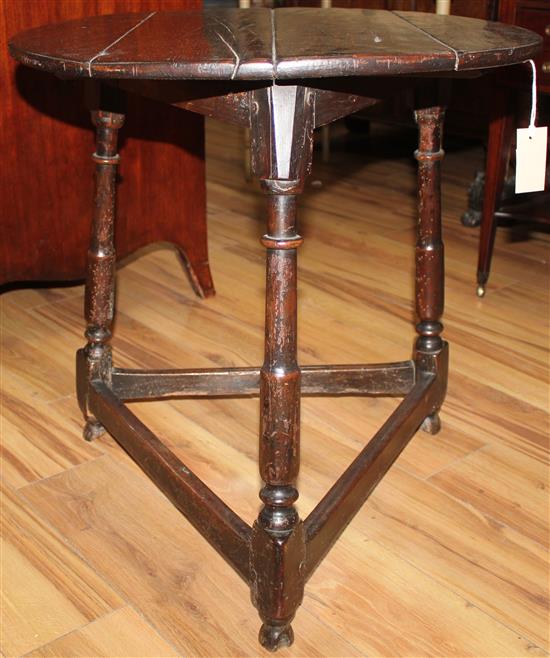 An 18th century and later oak and fruitwood cricket table, W.2ft 1in.